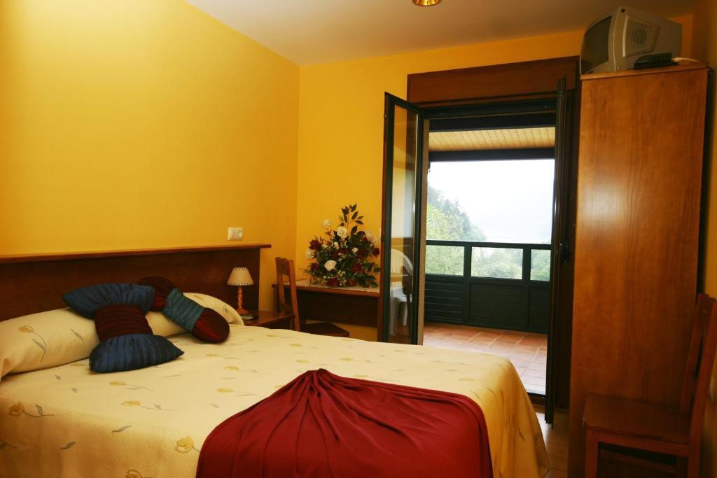 Hotel Restaurante Canero Pokoj fotografie