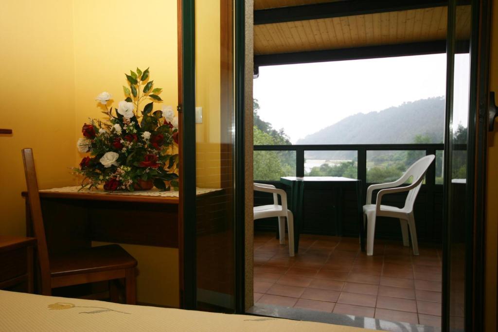 Hotel Restaurante Canero Pokoj fotografie